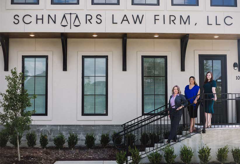 Attorney Dyan Schnaars And Team Outside Office